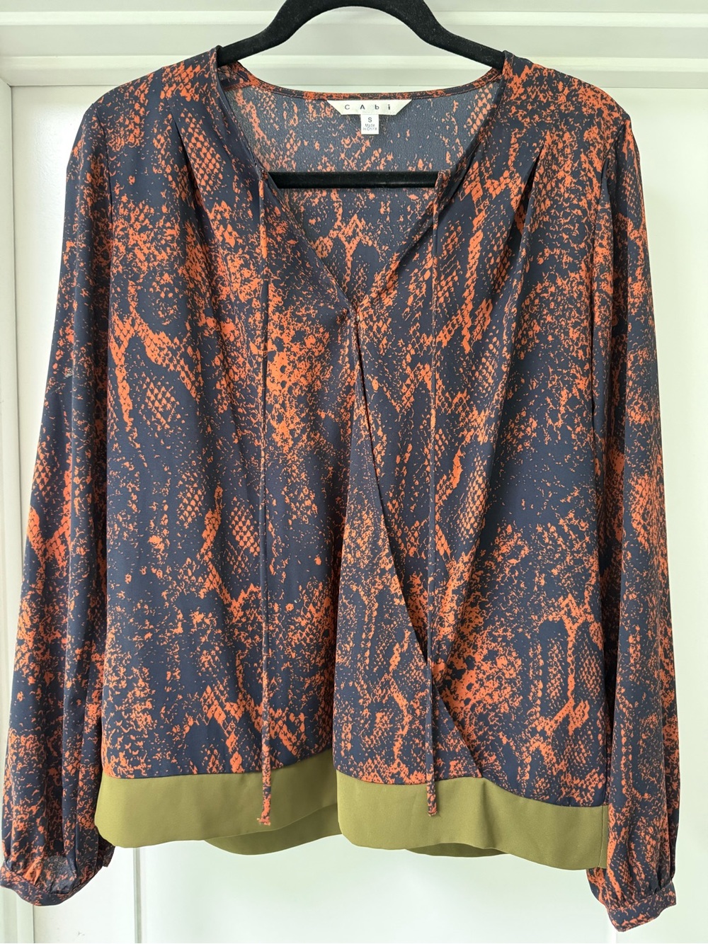 CAbi Navy & Orange Snake-Print V-Neck Blouse with Olive Hem